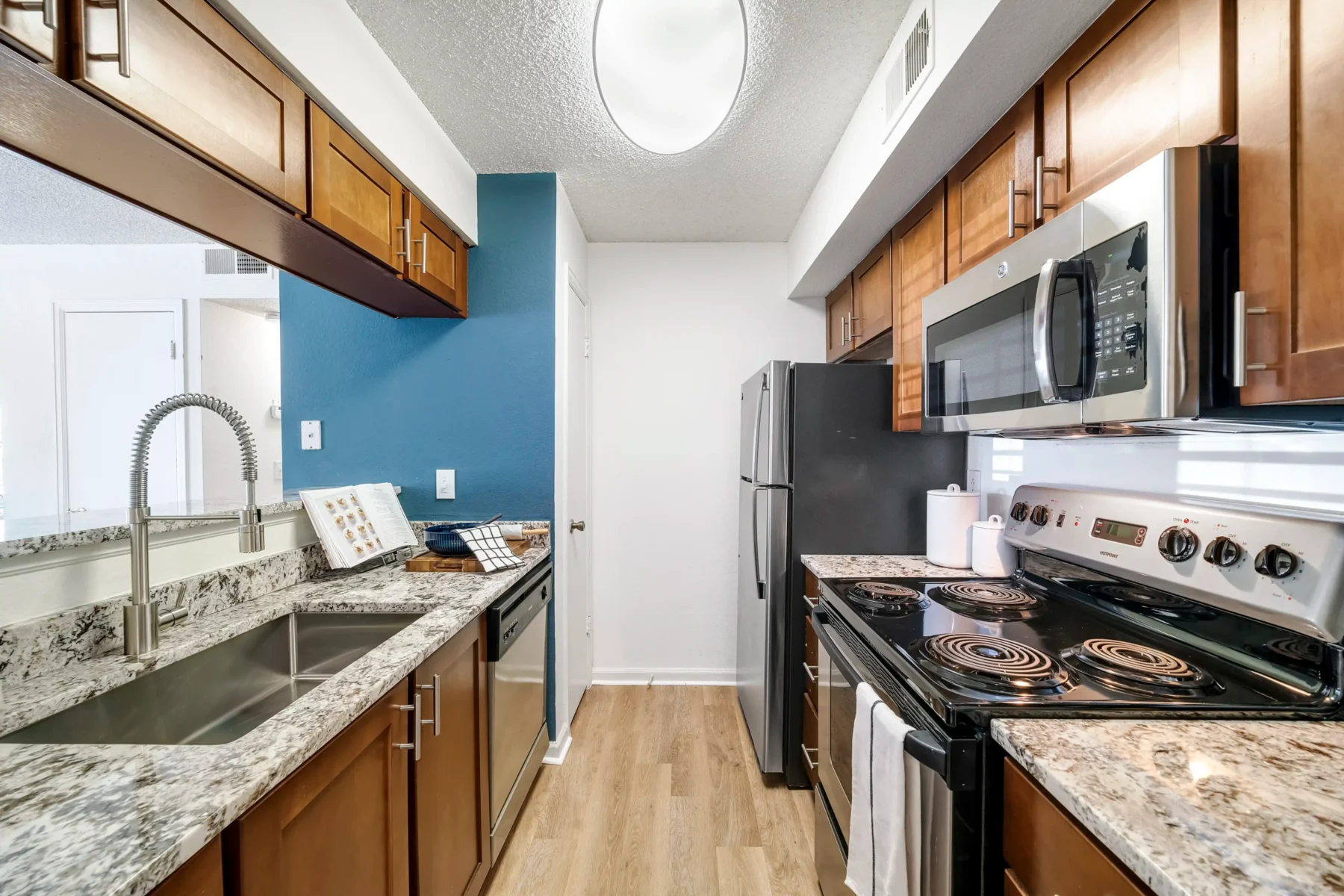 kitchen with granite counter tops and stainless steel appliances