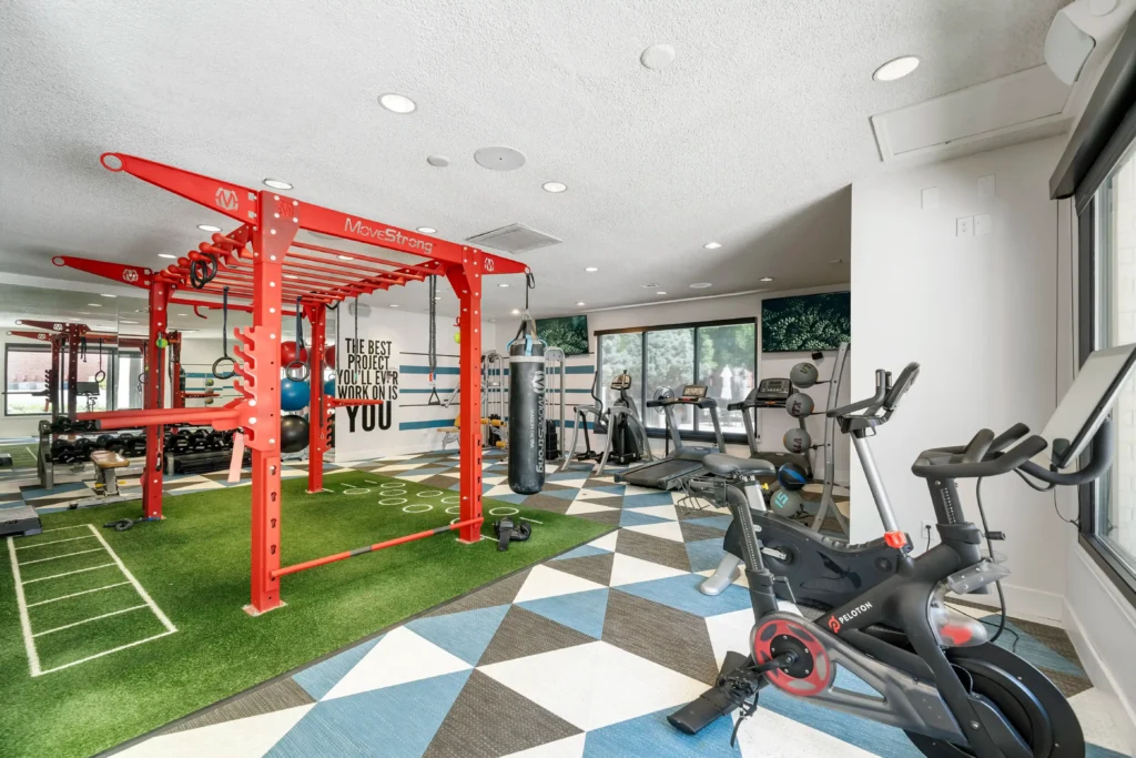 fitness center with strength training and cardio equipment